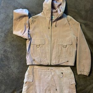 Wilson’s leather.  2 piece skirt set with hooded jacket. Suede, pink.